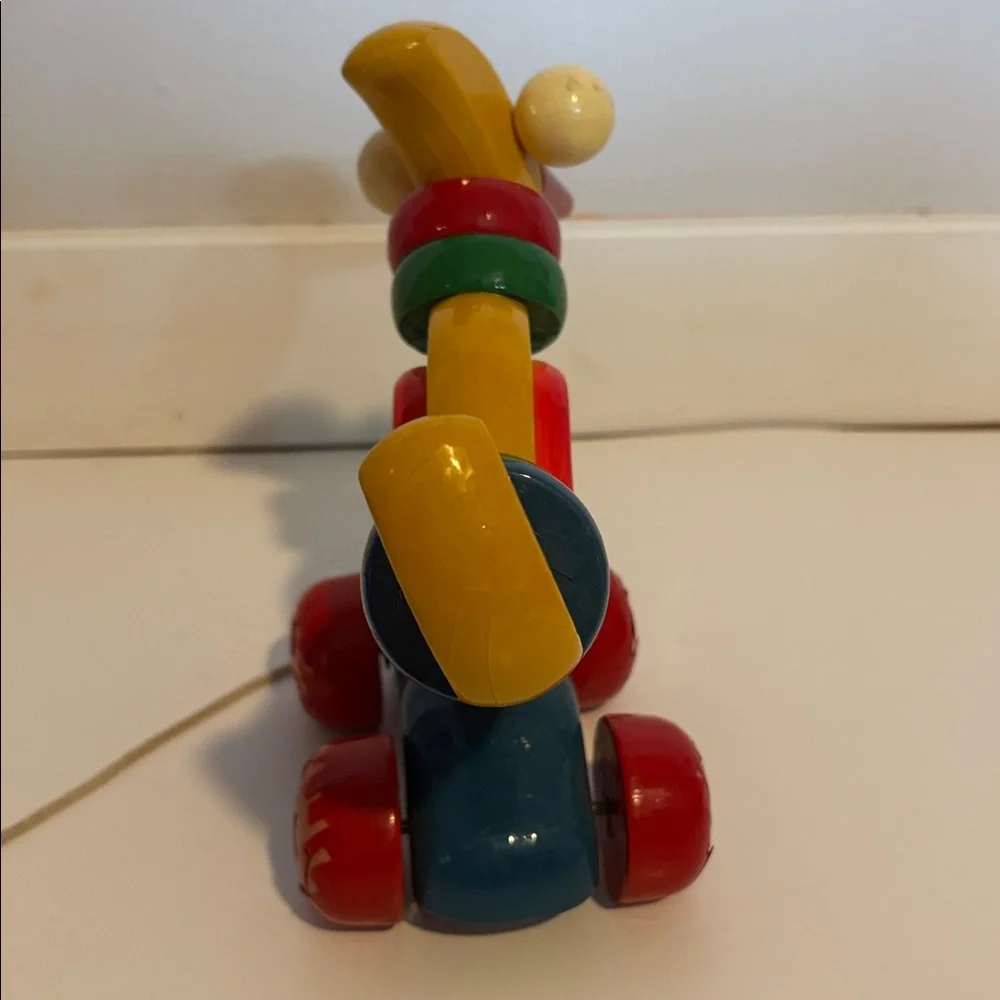 Vintage Kouvalias exotic bird Pull Toy 1990s